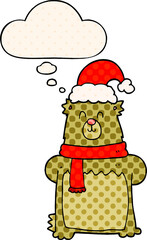 cartoon bear wearing christmas hat with thought bubble in comic book style