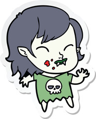 sticker of a cartoon vampire girl with blood on cheek