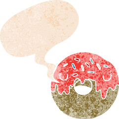 cartoon donut with speech bubble in grunge distressed retro textured style