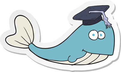 sticker of a cartoon whale graduate