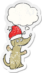 cute christmas cartoon dog with thought bubble as a distressed worn sticker