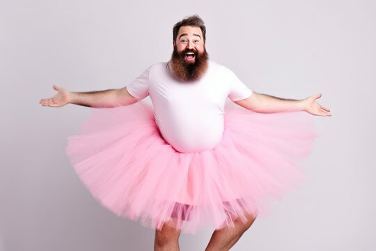 Fototapeta Funny man with big belly in fairy ballerina dress. Generative ai.