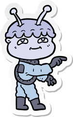 sticker of a friendly cartoon spaceman pointing