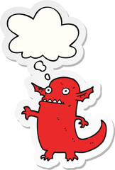 cartoon halloween monster with thought bubble as a printed sticker