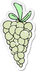 distressed sticker of a quirky hand drawn cartoon bunch of grapes