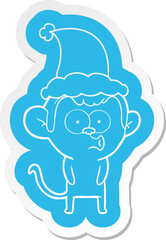 quirky cartoon  sticker of a hooting monkey wearing santa hat