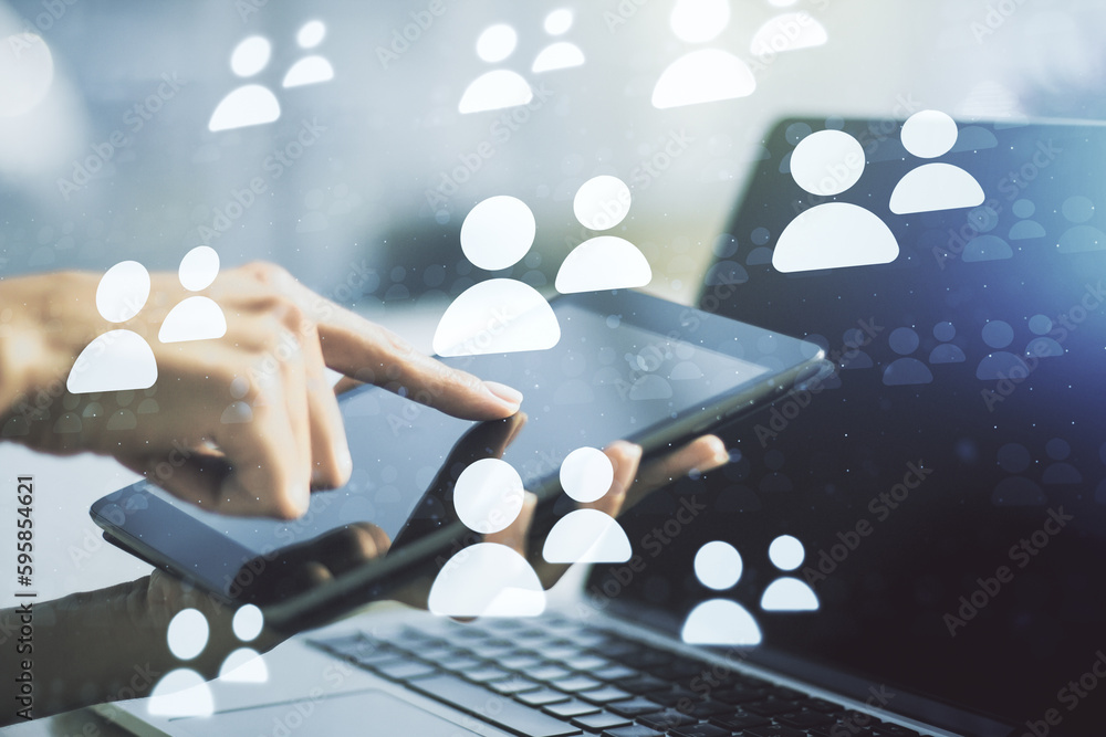 Poster Double exposure of social network icons concept and hand working with a digital tablet on background. Networking concept