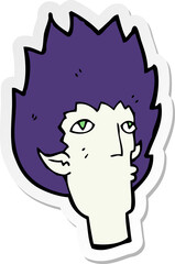 sticker of a cartoon vampire face