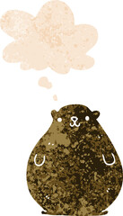 cartoon bear with thought bubble in grunge distressed retro textured style
