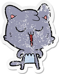 distressed sticker of a cartoon cat singing