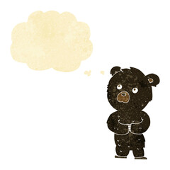 cartoon black bear cub with thought bubble