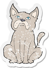 retro distressed sticker of a cartoon grumpy little dog