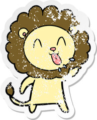 distressed sticker of a happy cartoon lion