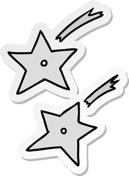 hand drawn sticker cartoon doodle of ninja throwing stars