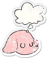 cartoon elephant face with thought bubble as a distressed worn sticker