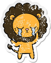 distressed sticker of a crying cartoon lion