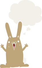 cartoon rabbit with thought bubble in retro style