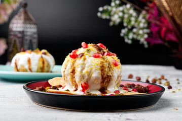 Raj Kachori has crispy fried shells filled with potatoes, yogurt, boiled lentils, spices, chutney & more! It's the the ultimate Indian chaat! - obrazy, fototapety, plakaty