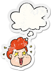 cartoon boy's face with thought bubble as a distressed worn sticker