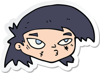 sticker of a cartoon scratched up face