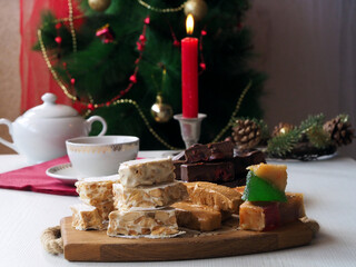 Chocolate and sugar Spanish turron with almonds y and fruit nougat