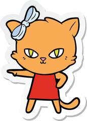 sticker of a cute cartoon cat wearing dress