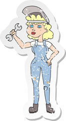 retro distressed sticker of a cartoon woman with spanner