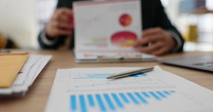 Seo businessman stamping document with report in office. Approved analytics and marketing report