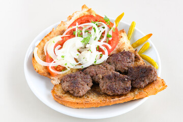 Meatball between bread (Turkish name : ekmek arasi kofte ). Izgara kofte
