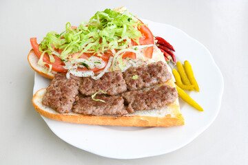Meatball between bread (Turkish name : ekmek arasi kofte ). Izgara kofte