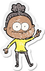 distressed sticker of a cartoon happy old woman