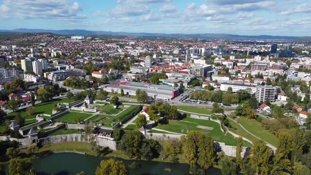 Aerial drone view of Banja Luka, Bosnia and Herzegovina. Buildings, streets, parks and residential houses. City center of Banja Luka, view from above. 