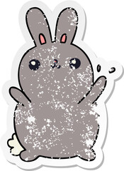 distressed sticker of a quirky hand drawn cartoon rabbit