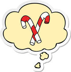 cartoon candy canes with thought bubble as a printed sticker