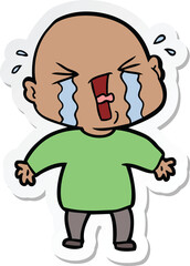 sticker of a cartoon crying bald man
