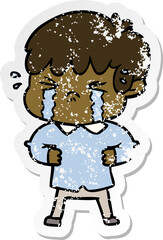 Obraz premium distressed sticker of a crying boy cartoon