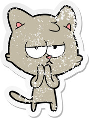 distressed sticker of a bored cartoon cat