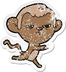 distressed sticker of a cartoon monkey