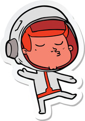sticker of a cartoon confident astronaut