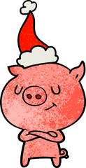 happy hand drawn textured cartoon of a pig wearing santa hat