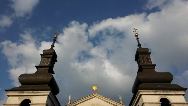 Drone is flying down along the wall of Trnava St John the Baptist Cathedral, 4k
