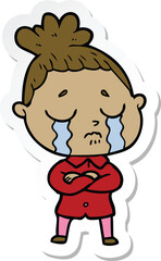 sticker of a cartoon crying woman