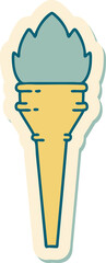 sticker of tattoo in traditional style of a lit torch