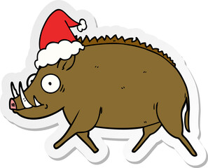 hand drawn sticker cartoon of a wild boar wearing santa hat