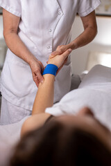 Obraz na płótnie Canvas Massage procedure - neck and whole body massage by a female masseuse. doing massaging using oil. 