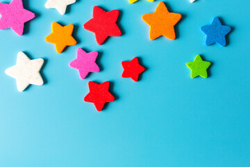 Star eva foam rubber for decoration isolated on blue background, decorative foam rubber material for creating artificial handmade star, View from above.