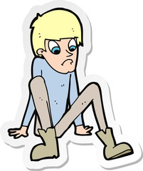 sticker of a cartoon boy sitting on floor