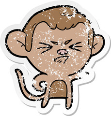 distressed sticker of a cartoon annoyed monkey