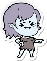 sticker of a annoyed cartoon vampire girl