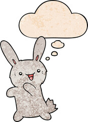 cartoon rabbit with thought bubble in grunge texture style